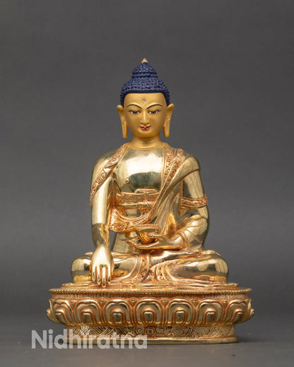 Front view Shakyamuni Buddha statue gold Nepal earth touching mudra meditation decor