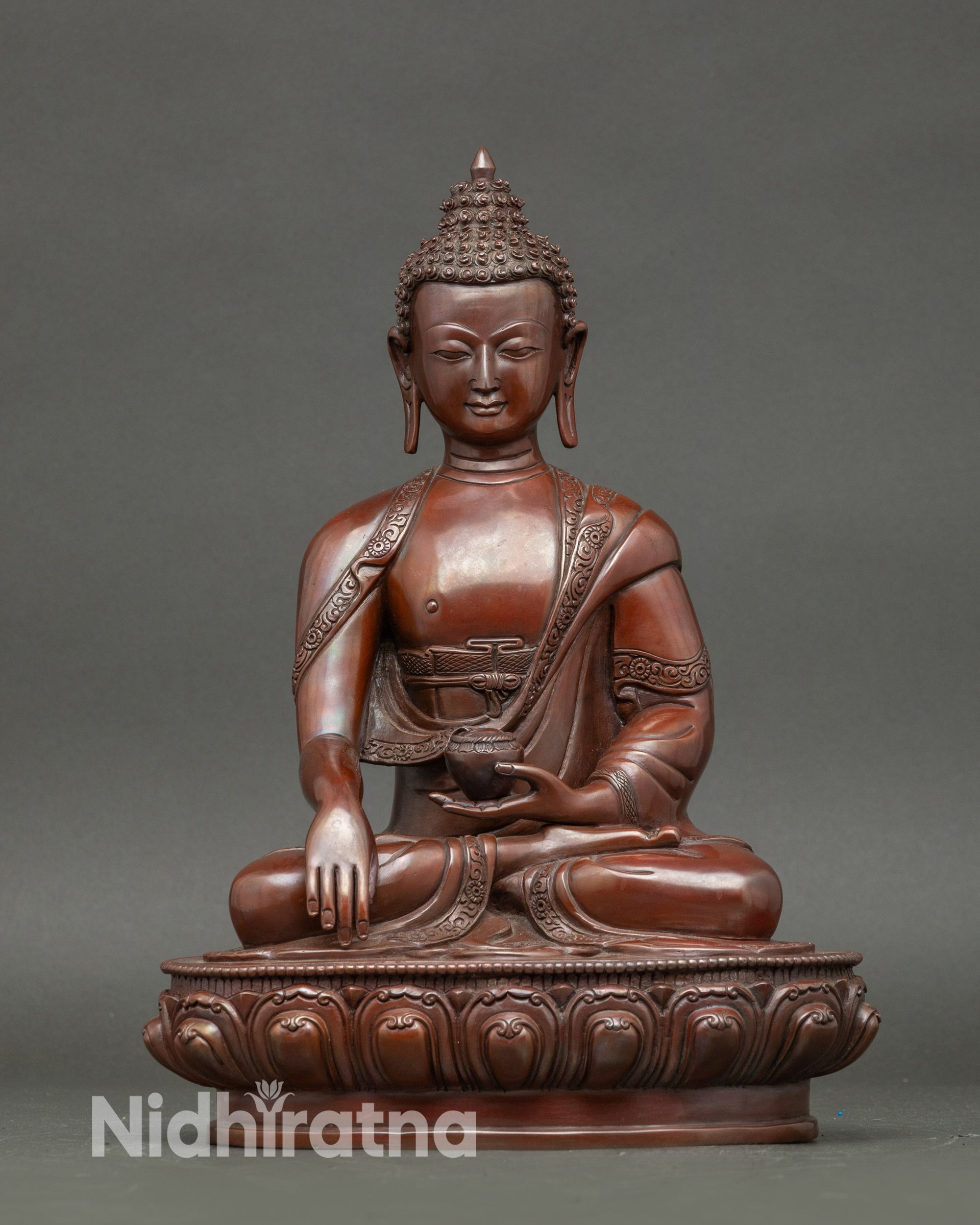 Front view Shakyamuni Buddha statue in oxidized copper, handcrafted by Newari artisans