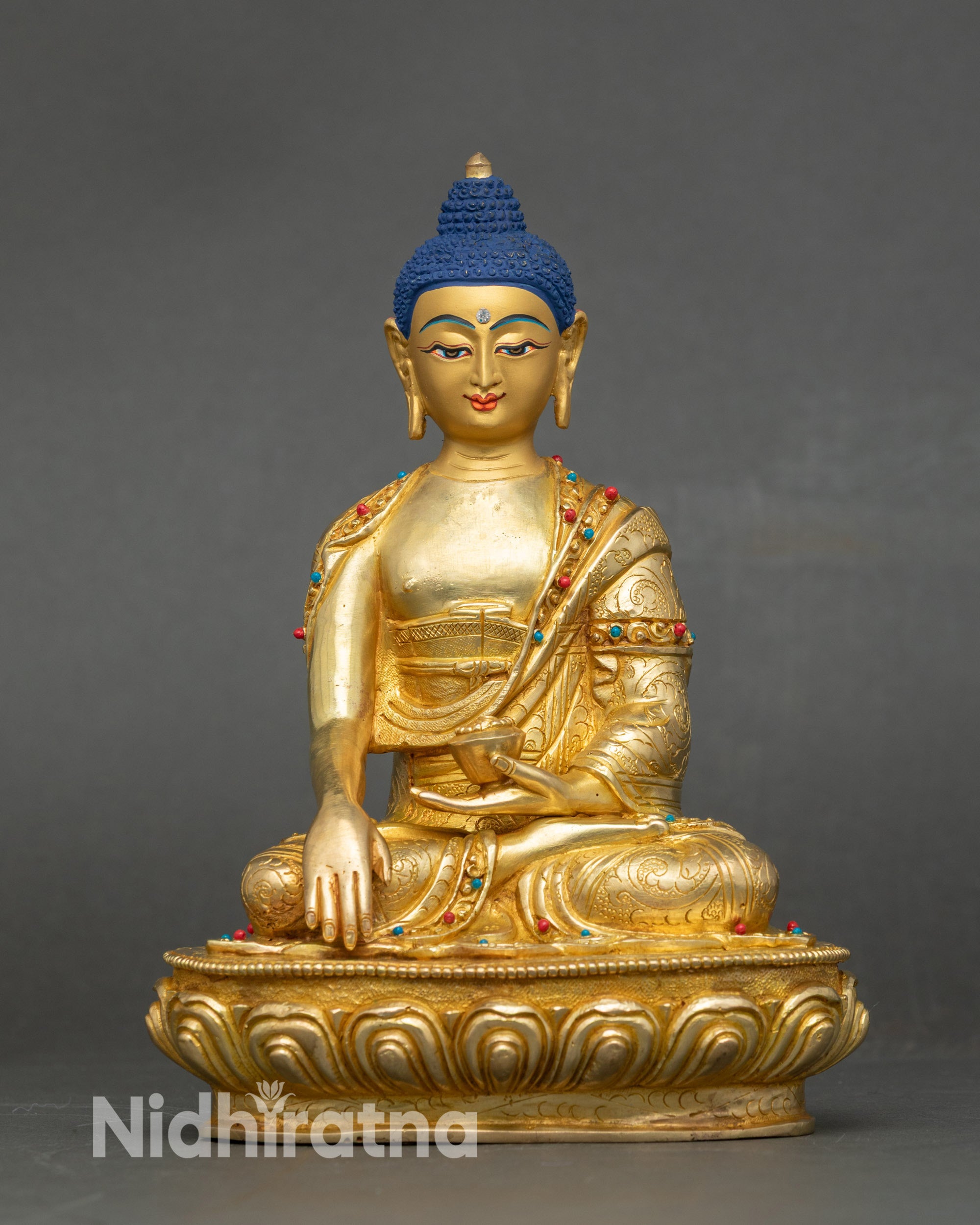 Front view Shakyamuni Buddha statue in pure gold with semi-precious stones handcrafted Nepalese art