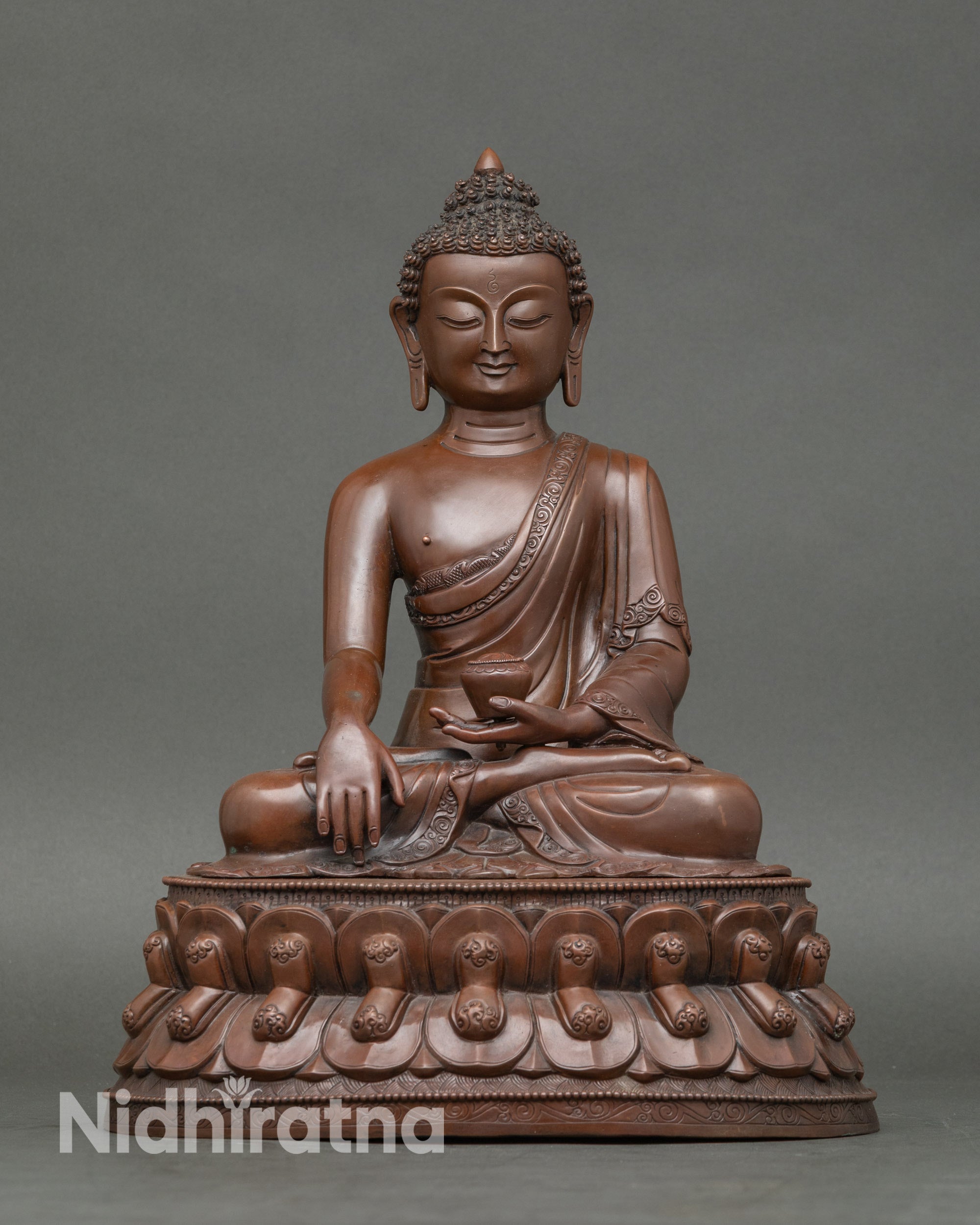 Front view Shakyamuni Buddha statue oxidized copper, seated on lotus seat for meditation