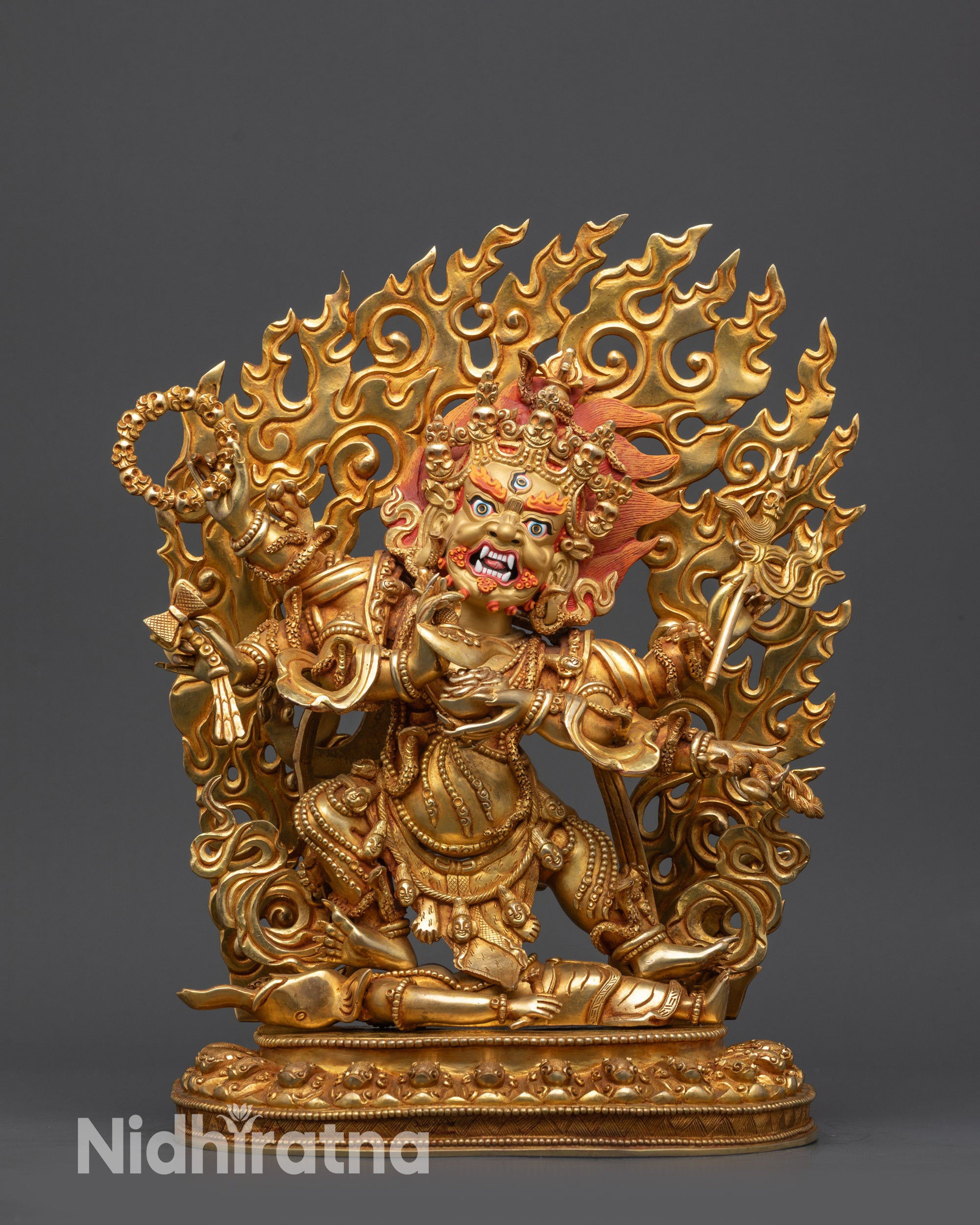 Front view Six-Armed Mahakala Statue with gold-gilded face and lotus base
