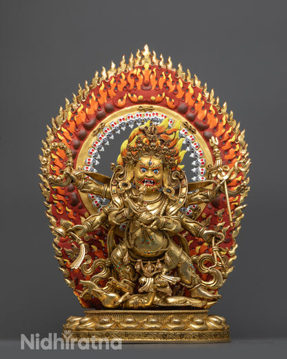 Front view Six-Armed Mahakala Statue with gold gilded face and blazing skull halo
