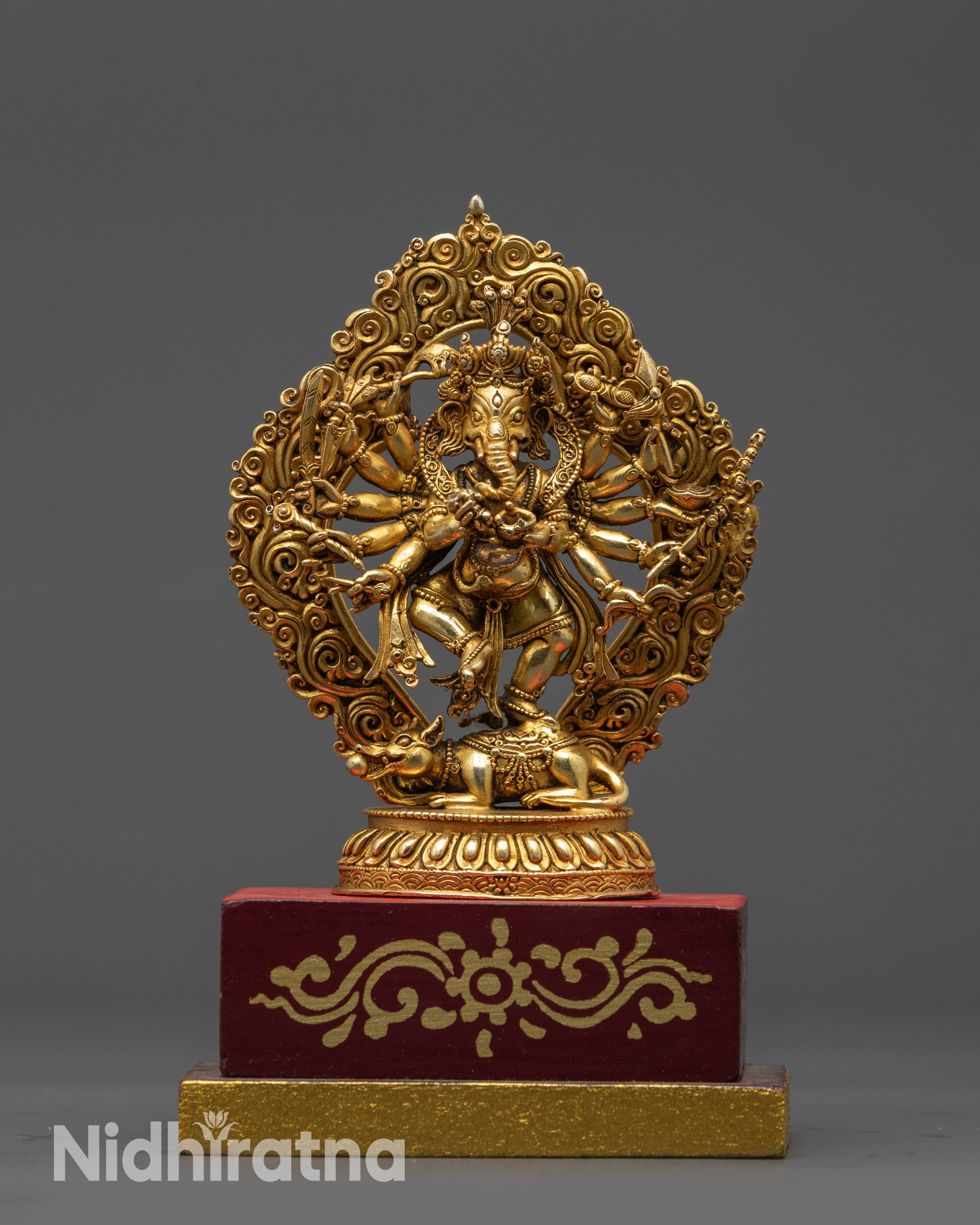 Front view Sixteen-Armed Dancing Ganesh Statue Nepal with gold-gilded lotus seat