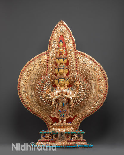 Front view Thousand-Armed Chenrezig Statue with 24K gold faces on lotus seat
