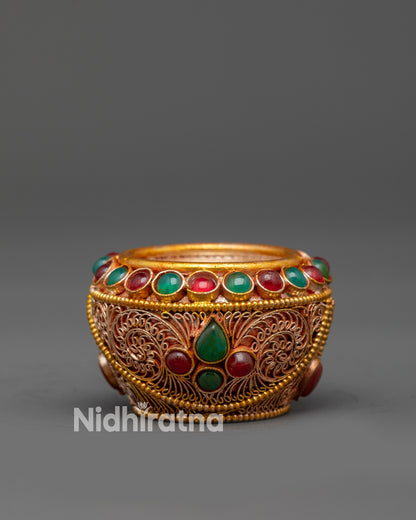 Front view Tibetan Golpa Offering Bowl with gold-plated filigree and stones