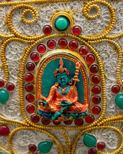 Front view Tibetan rice pot with carved Guru Rinpoche and gemstone silver gold details