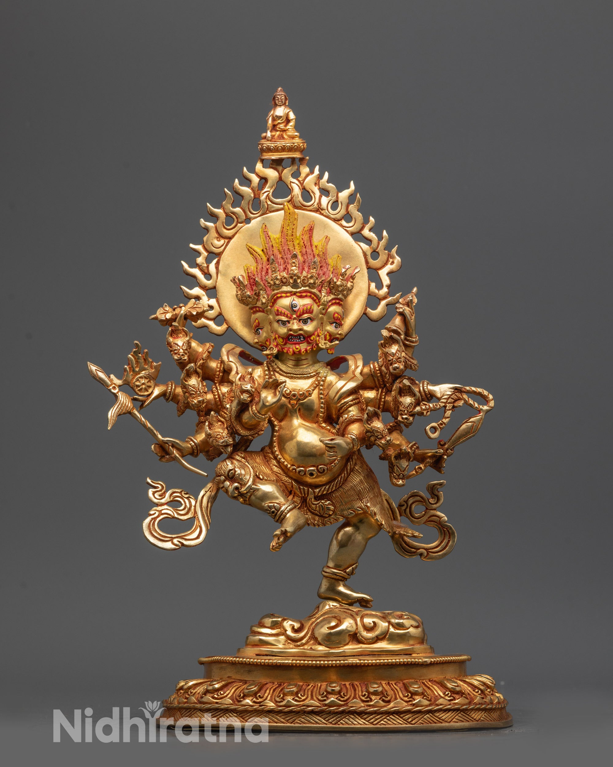 Front view Ucchusma Statue with three gold-gilded faces and eight arms, detailed lost-wax design
