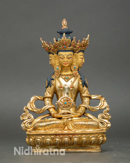 Front view Vairocana Buddha statue, gold-gilded faces, five-jeweled crown, lotus pedestal Nepal