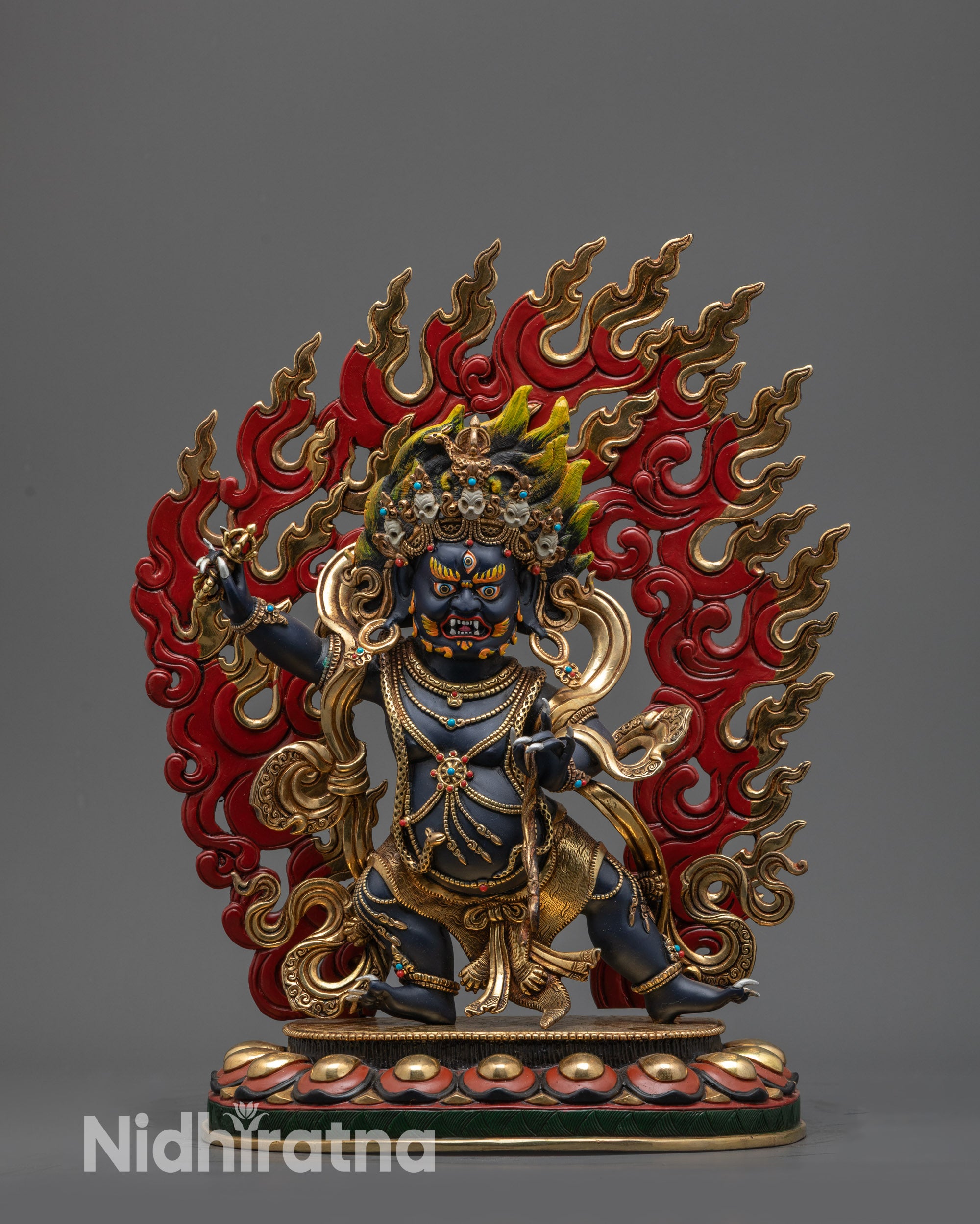Front view Vajrapani Buddhist statue with gold-plated robes on lotus seat
