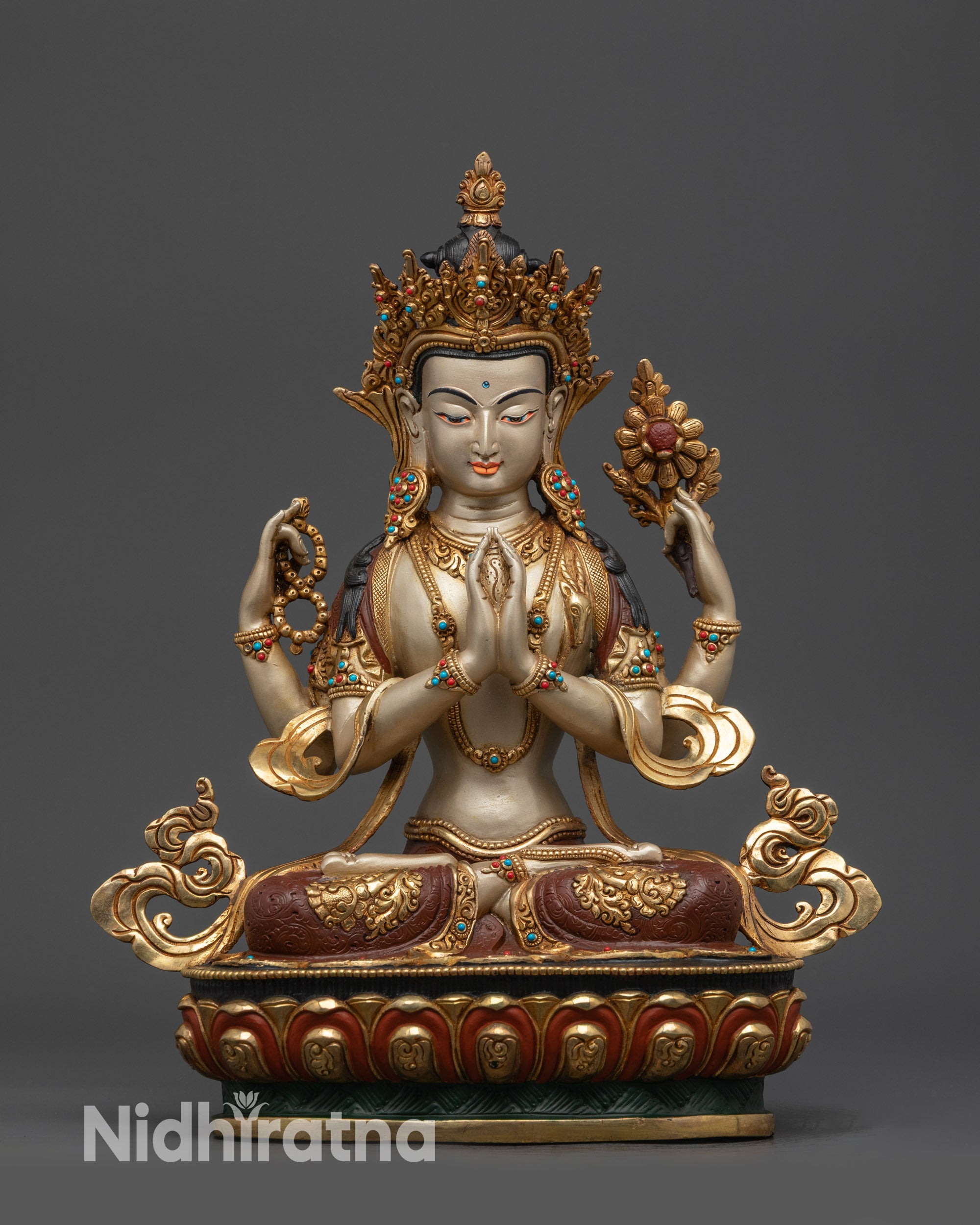 Front view White-Hued Four-Armed Chenrezig Statue with lotus pedestal and gold robe
