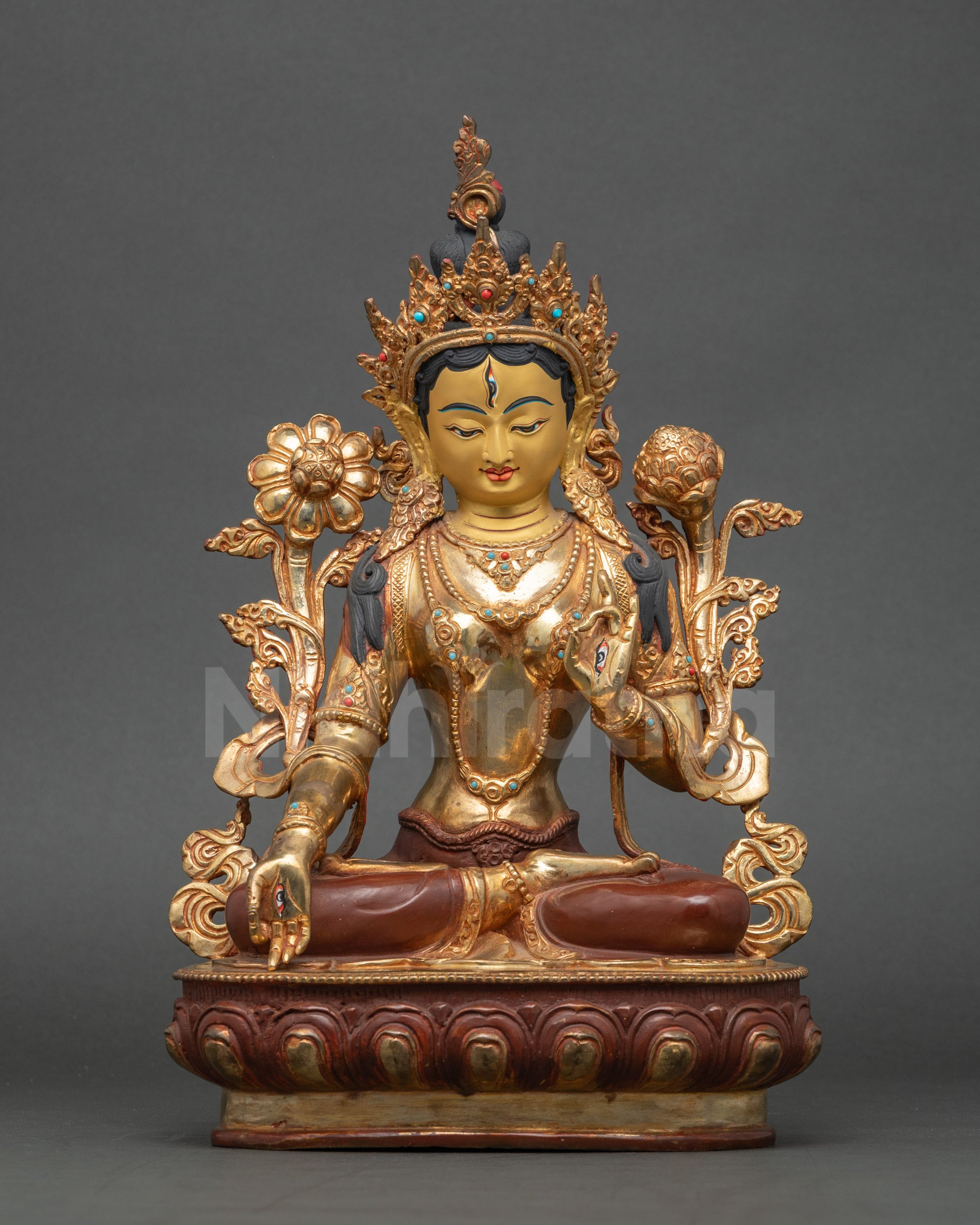 Front view White Tara Buddha statue, handmade Nepalese copper, gold-painted face, oxidized finish