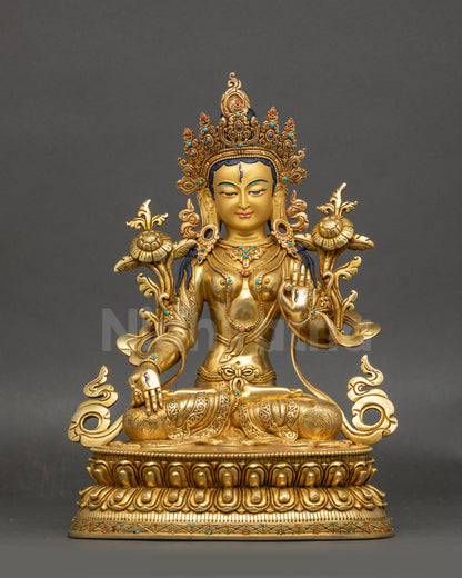 Front view White Tara meditation statue with gold fire-gilded copper surface
