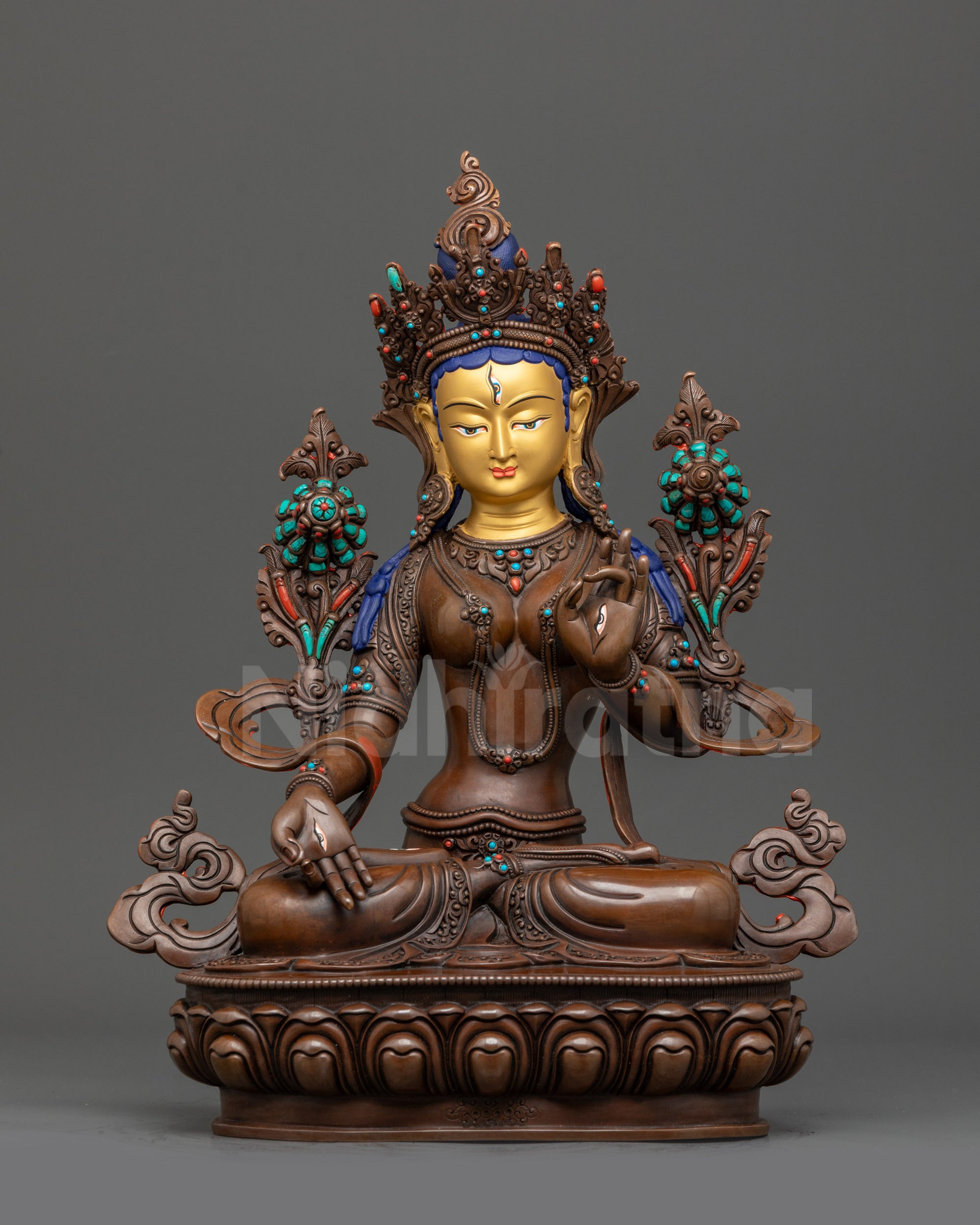 Front view White Tara oxidized statue on double-lotus seat with gold-gilded face
