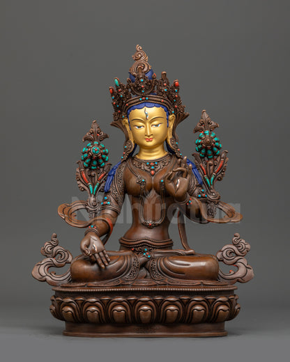 Front view White Tara oxidized statue on double-lotus seat with gold-gilded face

