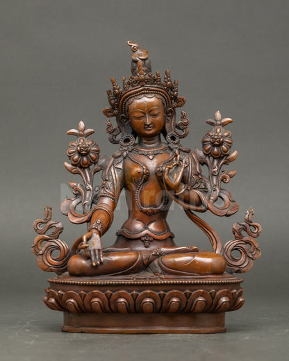 Front view White Tara statue copper oxidized finish with seven eyes Nepalese craftsmanship