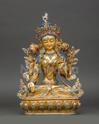 Front view White Tara statue with gold fire-gilded face and silver-plated details