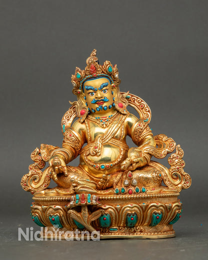 Front view Yellow Dzambhala statue gold-gilded copper with lotus throne and jewel mongoose