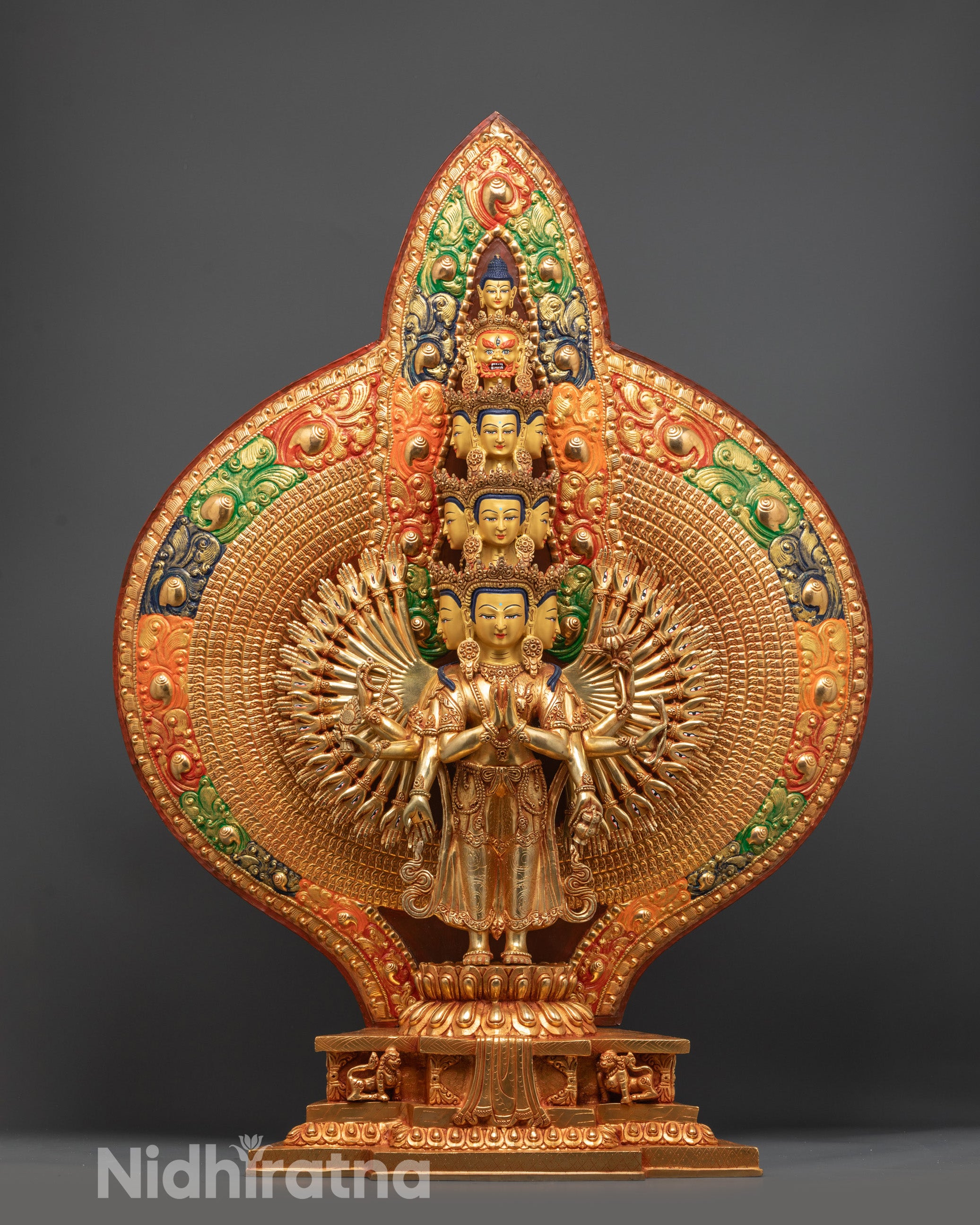 Front view of 1000-Armed Chenrezig Statue with 24K gold face and lotus throne