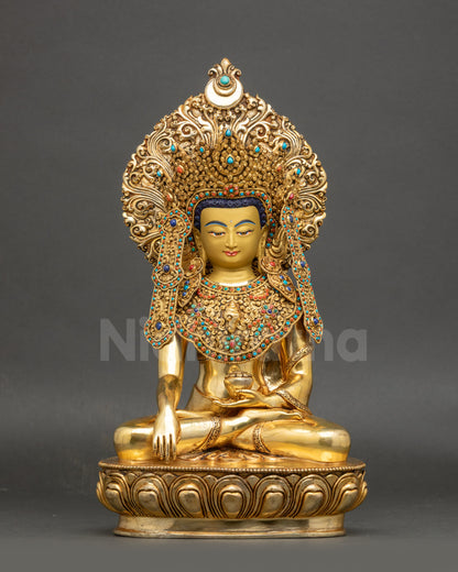 Front view of 24K gold fire-gilded Jowo Shakyamuni Buddha seated on lotus pedestal
