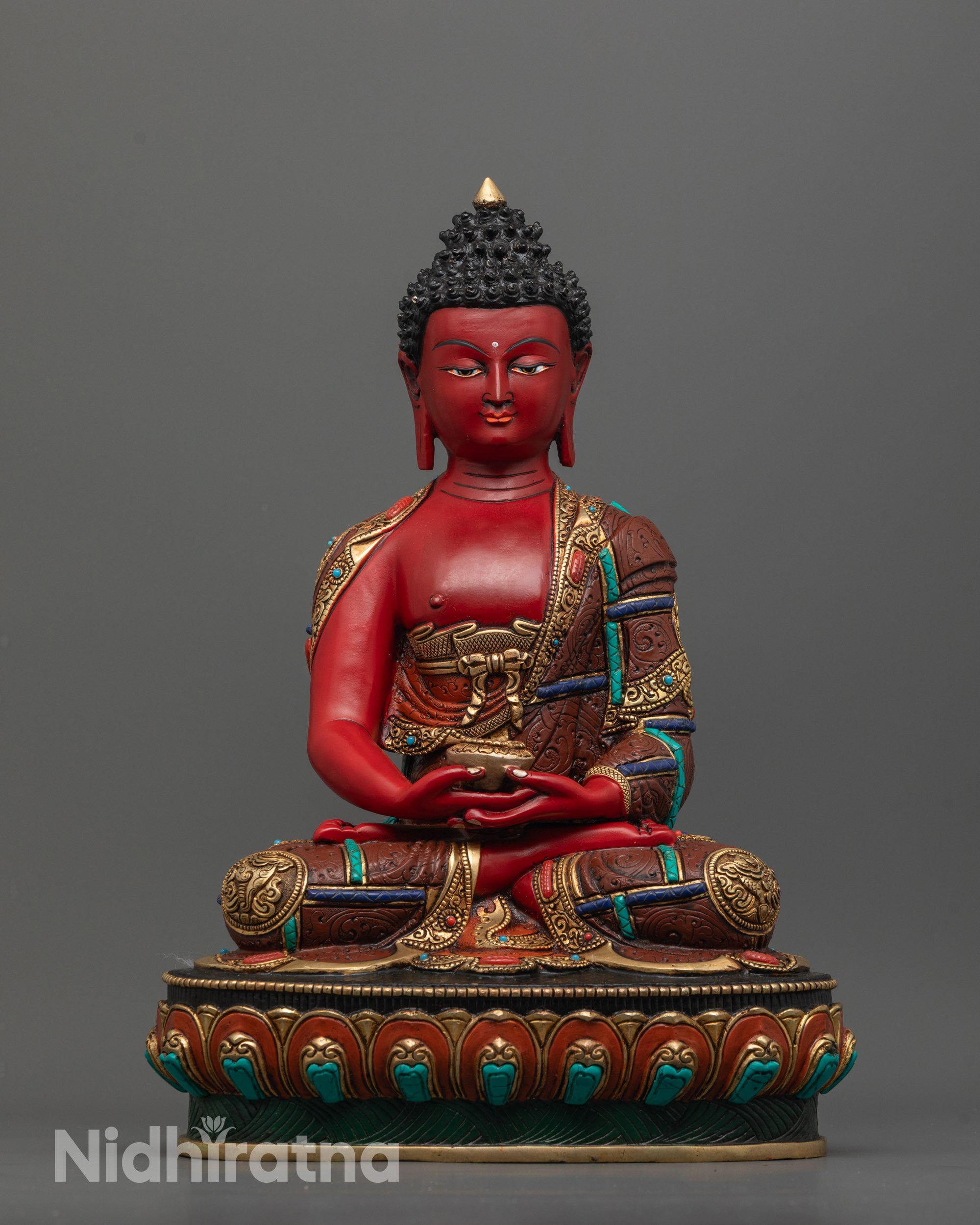Front view of Amitabha Buddha Sculpture with red body and gold-plated details
