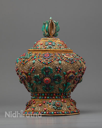 Front view of Ashtamangala Tibetan Ricepot with copper filigree and semi-precious stones