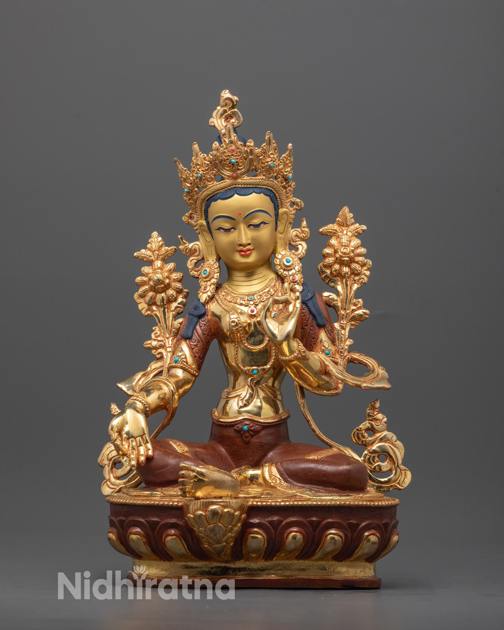 Front view of Authentic Green Tara Sculpture with gold accents and intricate copper carvings