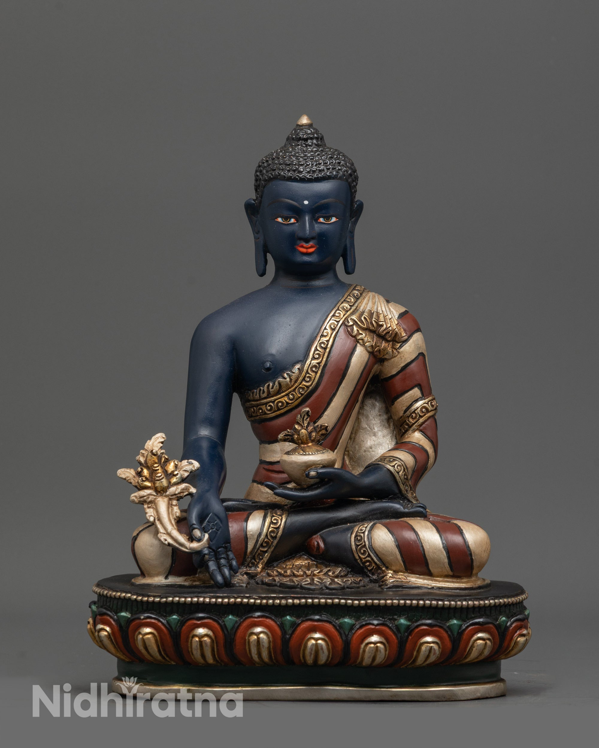 Front view of Bhaisajyaguru Buddha Statue with blue body and gold-plated robe
