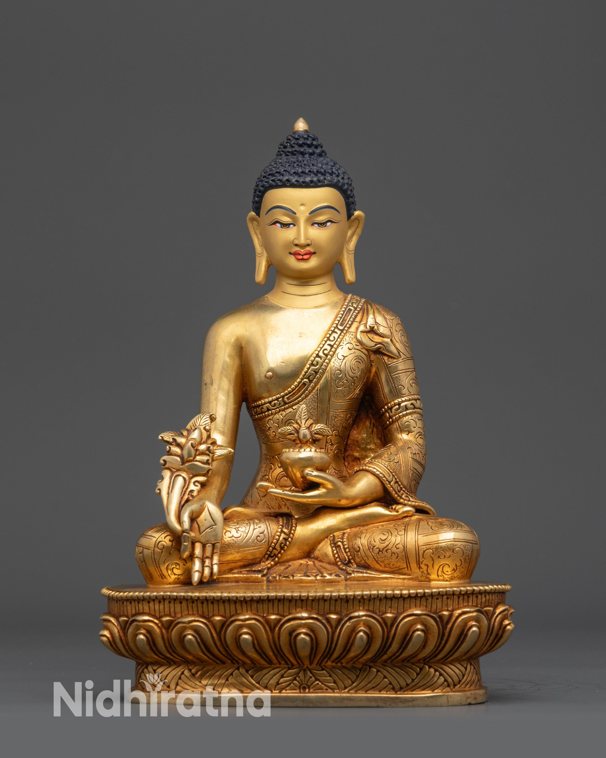 Front view of Bhaisajyaguru Medicine Buddha statue with lotus seat and gold-gilded finish
