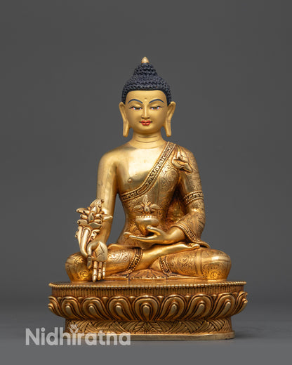 Front view of Bhaisajyaguru Medicine Buddha statue with lotus seat and gold-gilded finish
