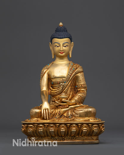 Front view of Bodhi Shakyamuni Buddha statue with lotus seat and gold-gilded finish
