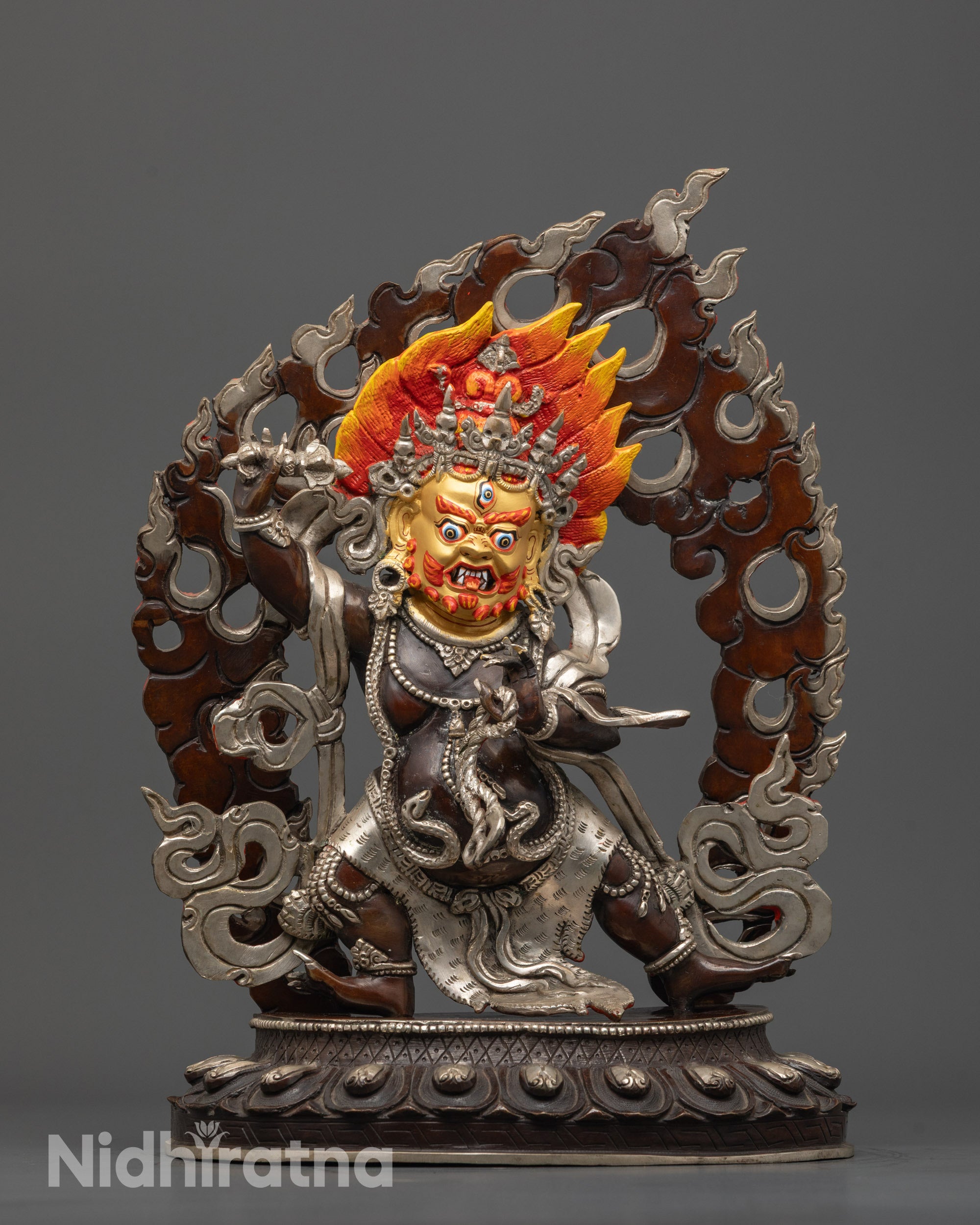 Front view of Bodhisattva Vajrapani statue with 24k gold-gilded face and silver halo