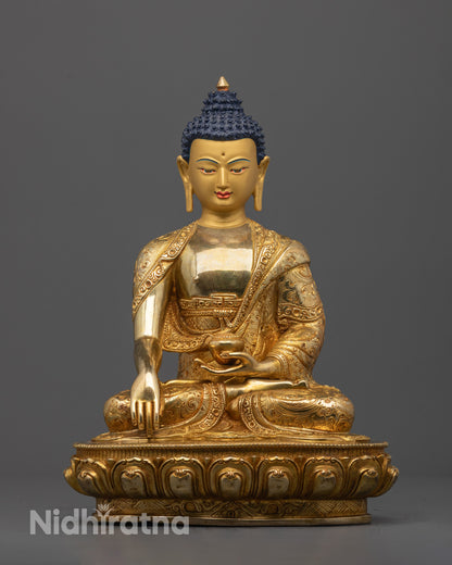 Front view of Buddha Shakyamuni Statue with gold-gilded face in Bhumisparsa Mudra