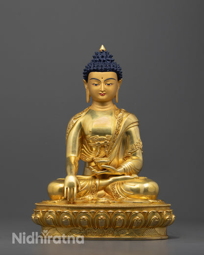 Front view of Buddha Shakyamuni statue with 24K gold-gilded face and detailed lotus throne