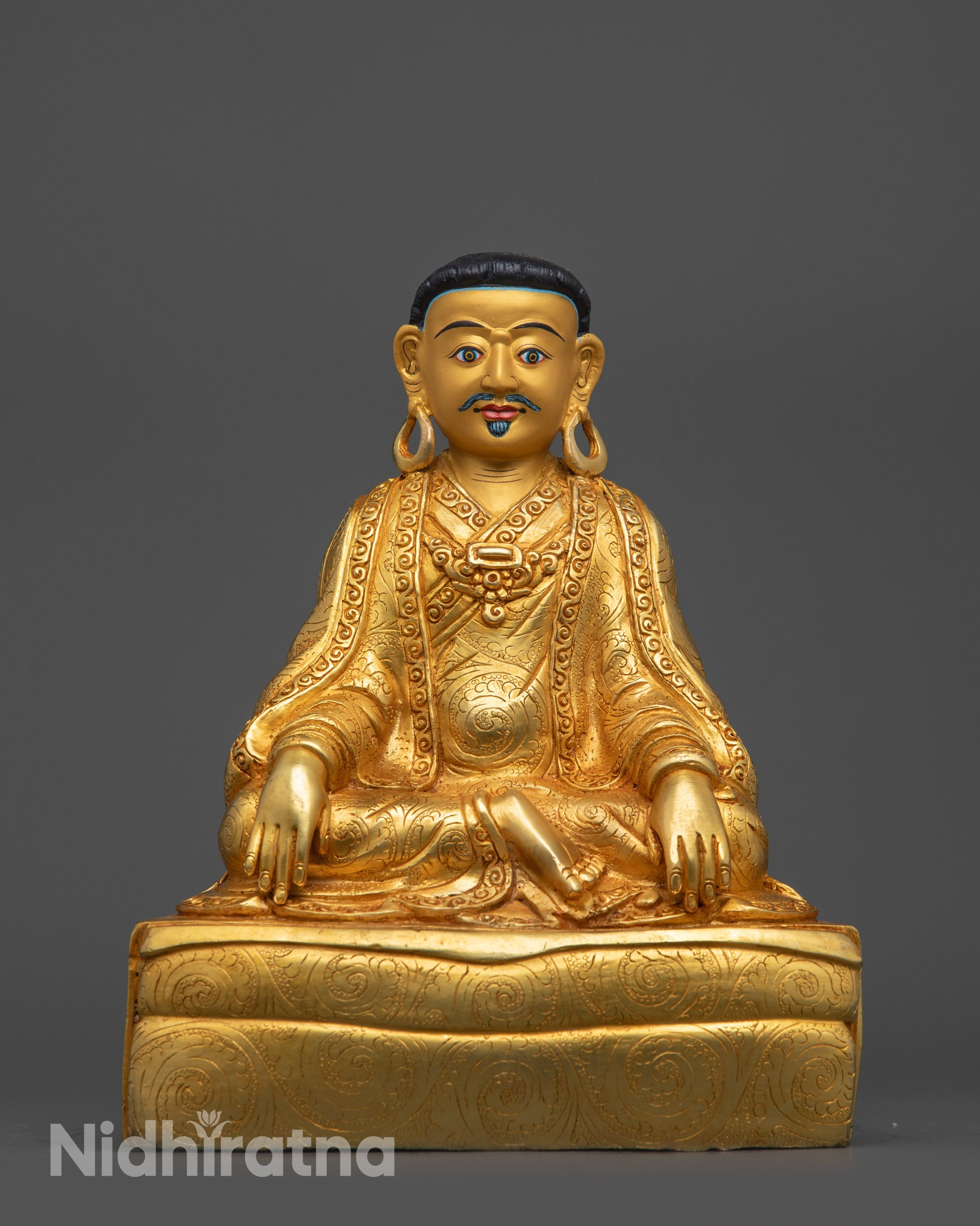 Front view of Buddhist Master Marpa Statue with gold-gilded face and fire-gilded body