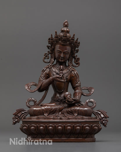 Front view of machine-made Vajrasattva statue with oxidized copper and electroplated detail