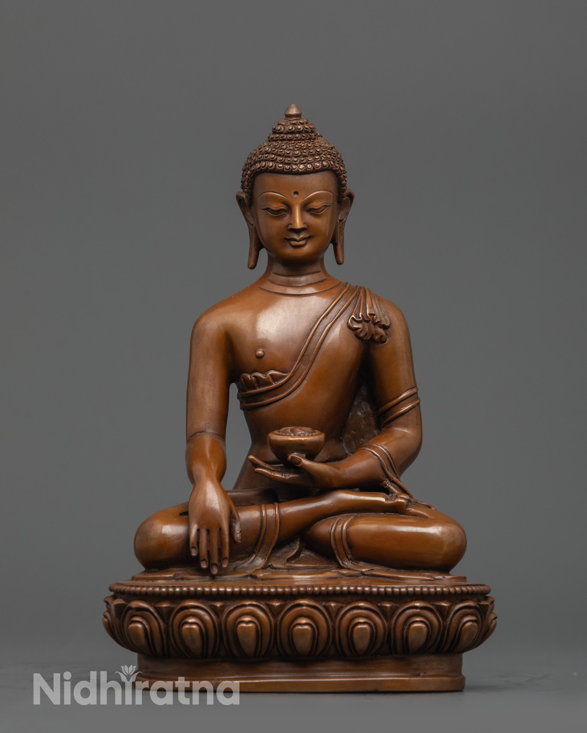 Front view of Calm Shakyamuni Buddha Statue in oxidized copper on lotus seat