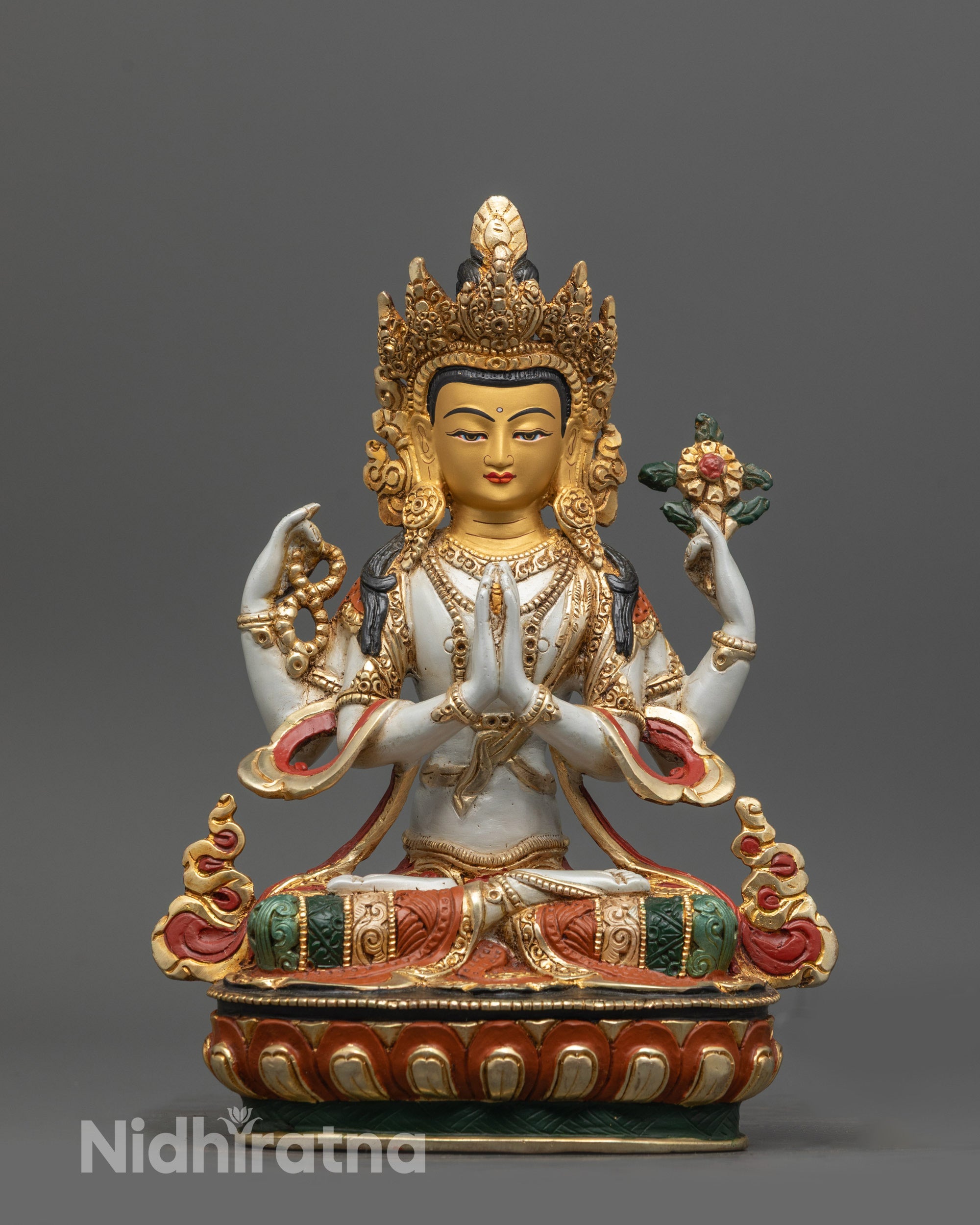 Front view of Chenrezig Sculpture with white body gold-gilded face and lotus seat