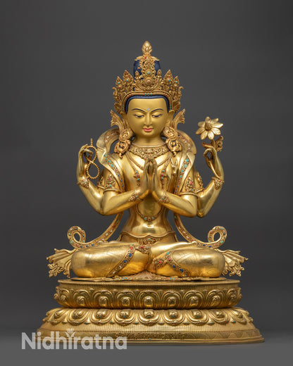 Front view of Chenrezig Statue showing four-armed Bodhisattva on lotus base
