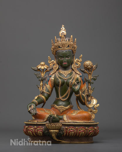 Front view of Colored Green Tara Statue seated on a lotus base, adorned with a five-jeweled crown