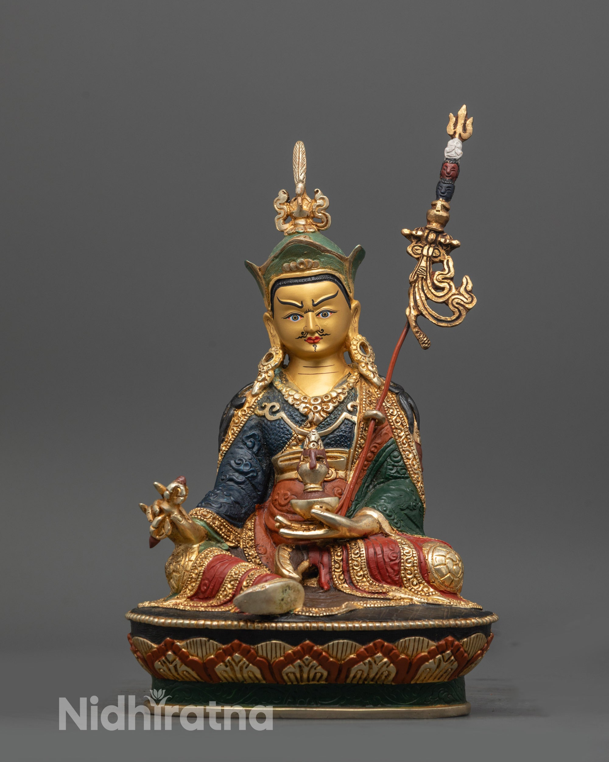 Front view of Colored Padmasambhava Statue with gold-gilded face and colored robe