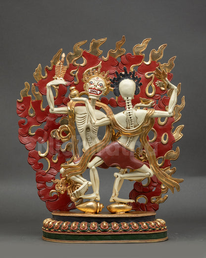 Front view of Dancing Citipati Sculpture showing male and female skeleton deities
