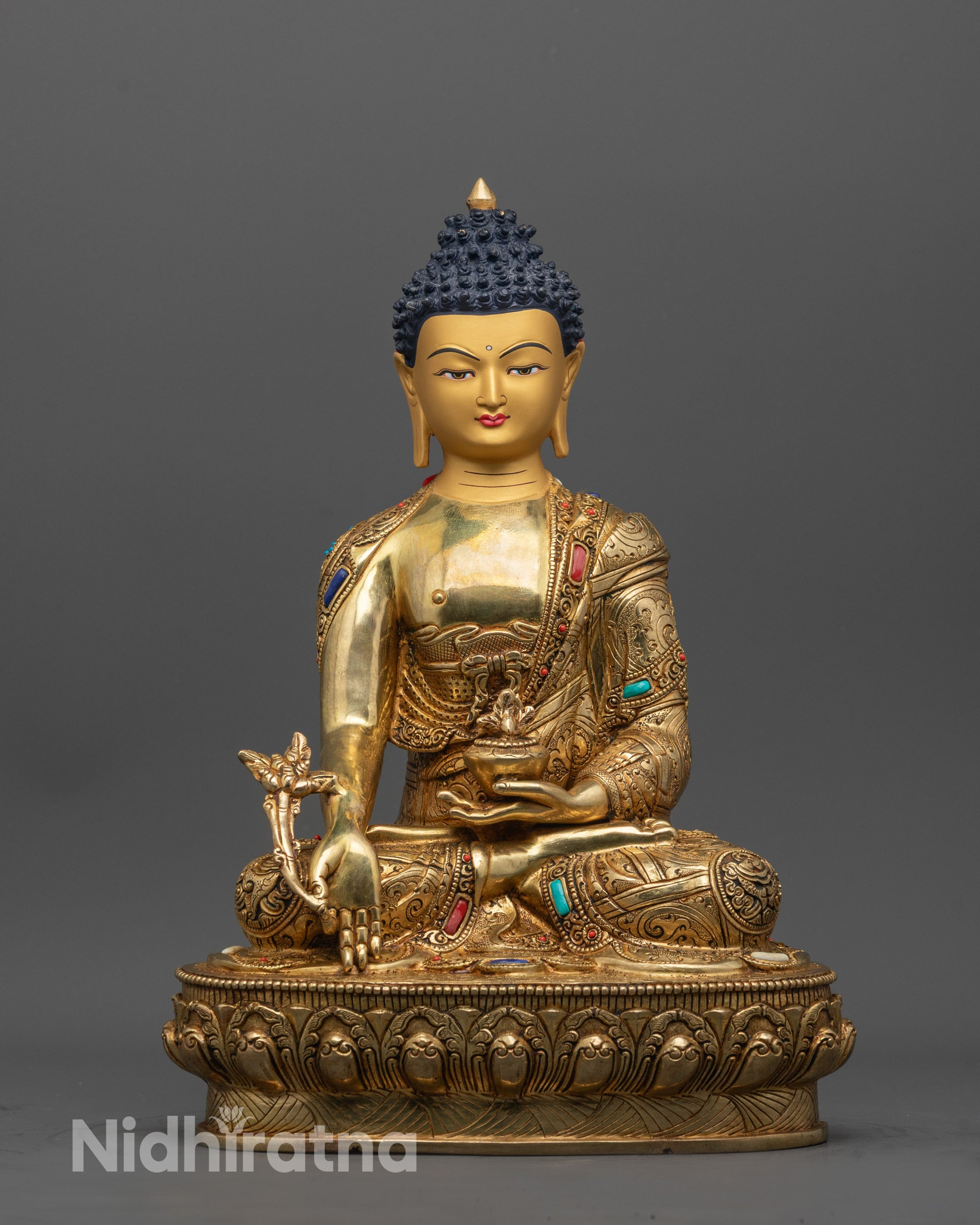 Front view of Detailed Medicine Buddha Statue with gold-gilded face and lotus base