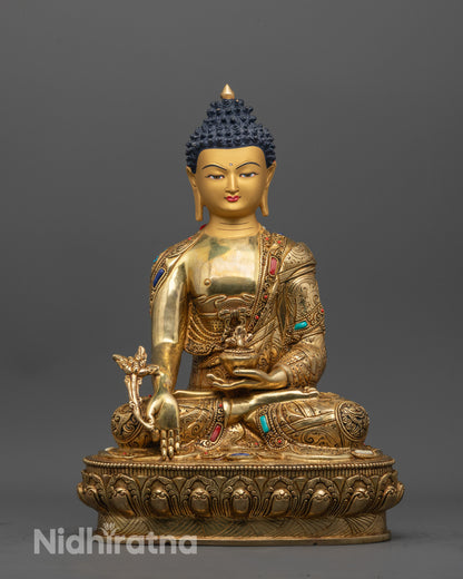 Front view of Detailed Medicine Buddha Statue with gold-gilded face and lotus base