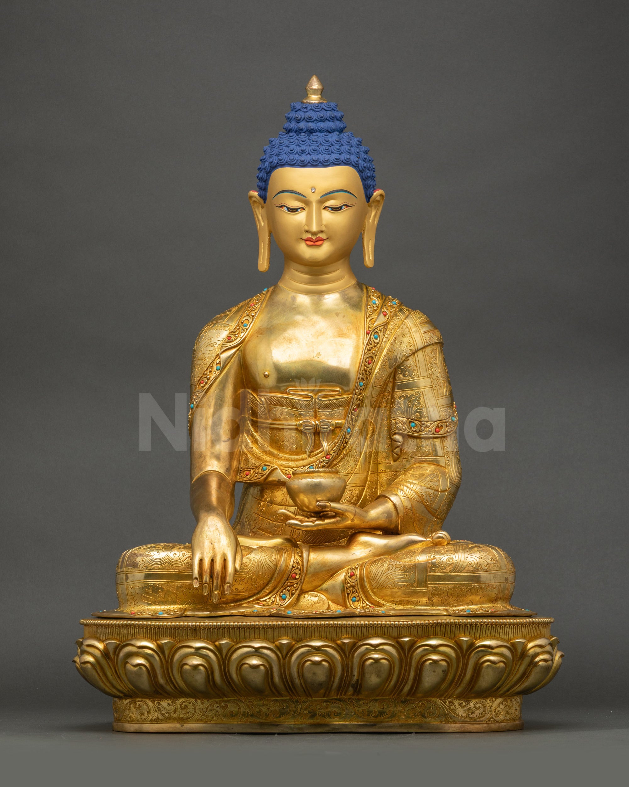 Front view of Divine Shakyamuni Buddha Sculpture with gold-painted face and detailed robes