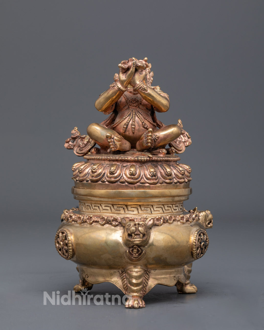 Front view of Dorje Khadro statue seated on lotus throne with fire-gilded gold finish