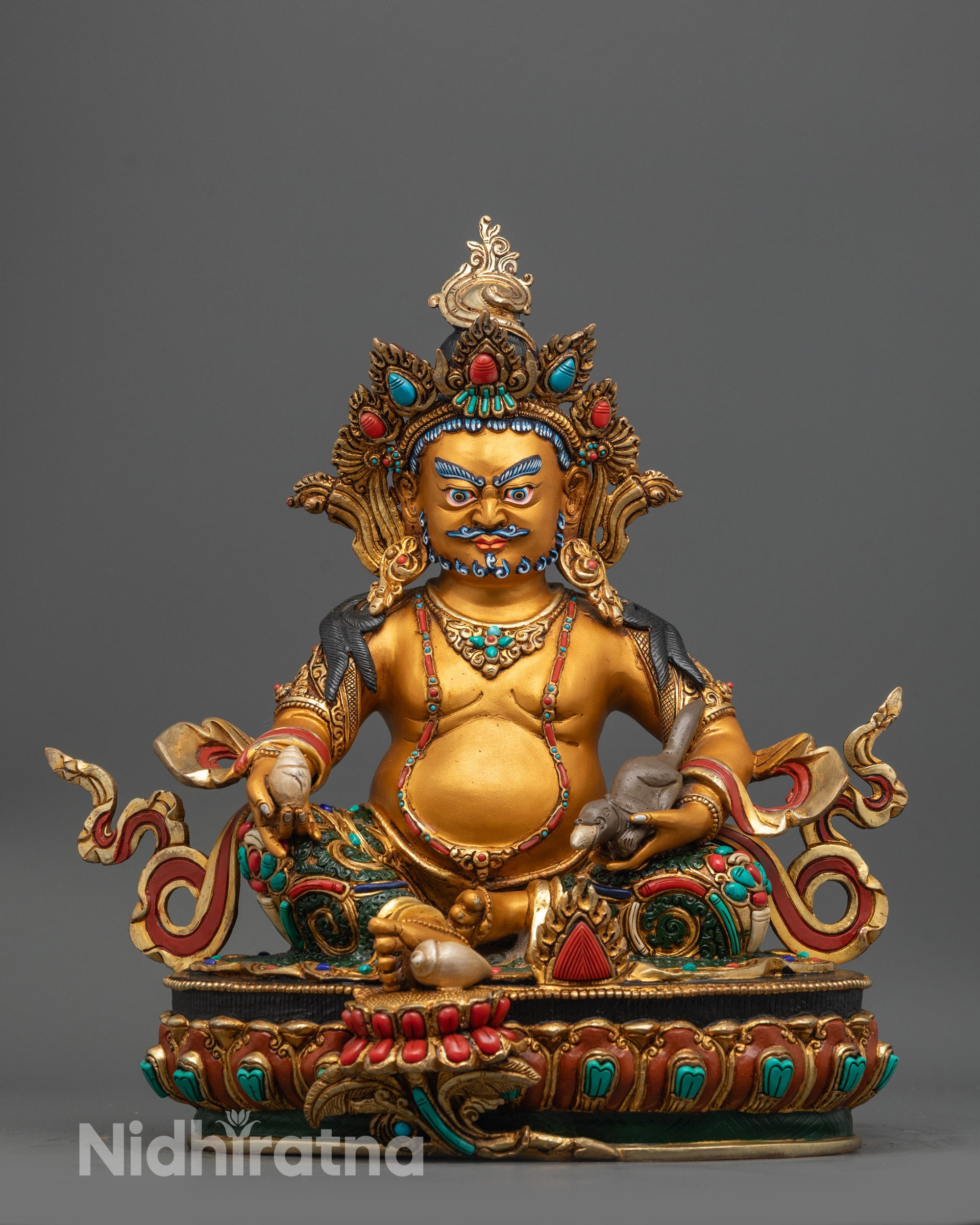 Front view of Dzambhala Sculpture with yellow body, gold-plated robe, and semi-precious stones