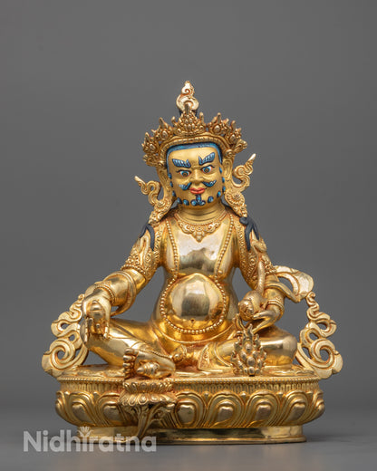 Front view of Dzambhala Statue seated on lotus base with 24k gold finish