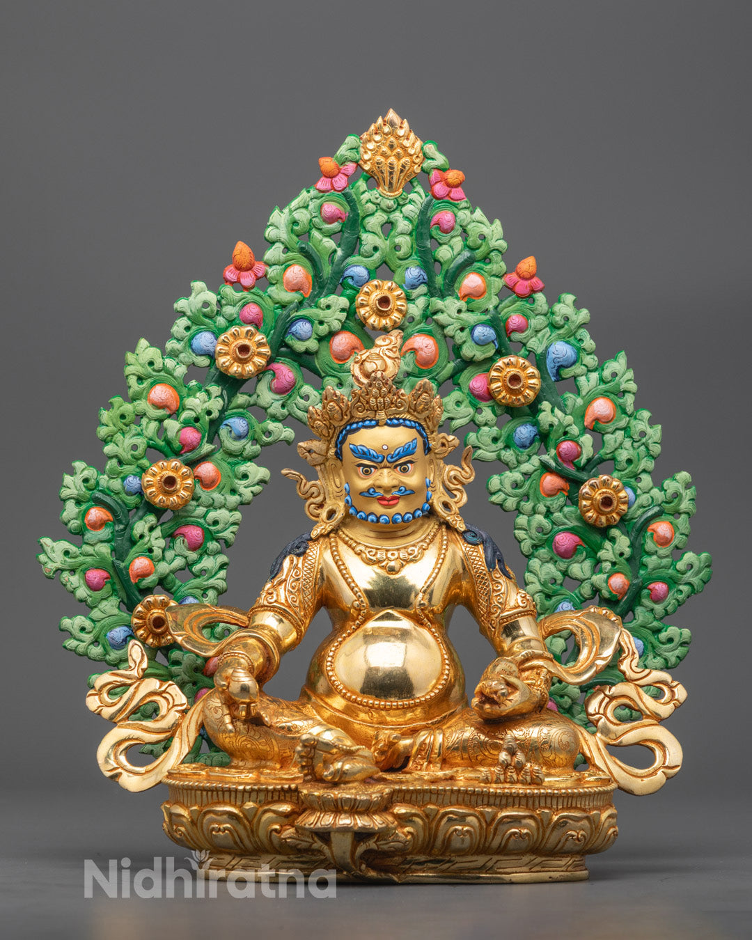 Front view of Dzambhala statue with 24k gold-gilded face and lotus throne
