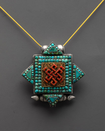 Front view of Endless Knot Locket with coral turquoise stones and gold-plated filigree design