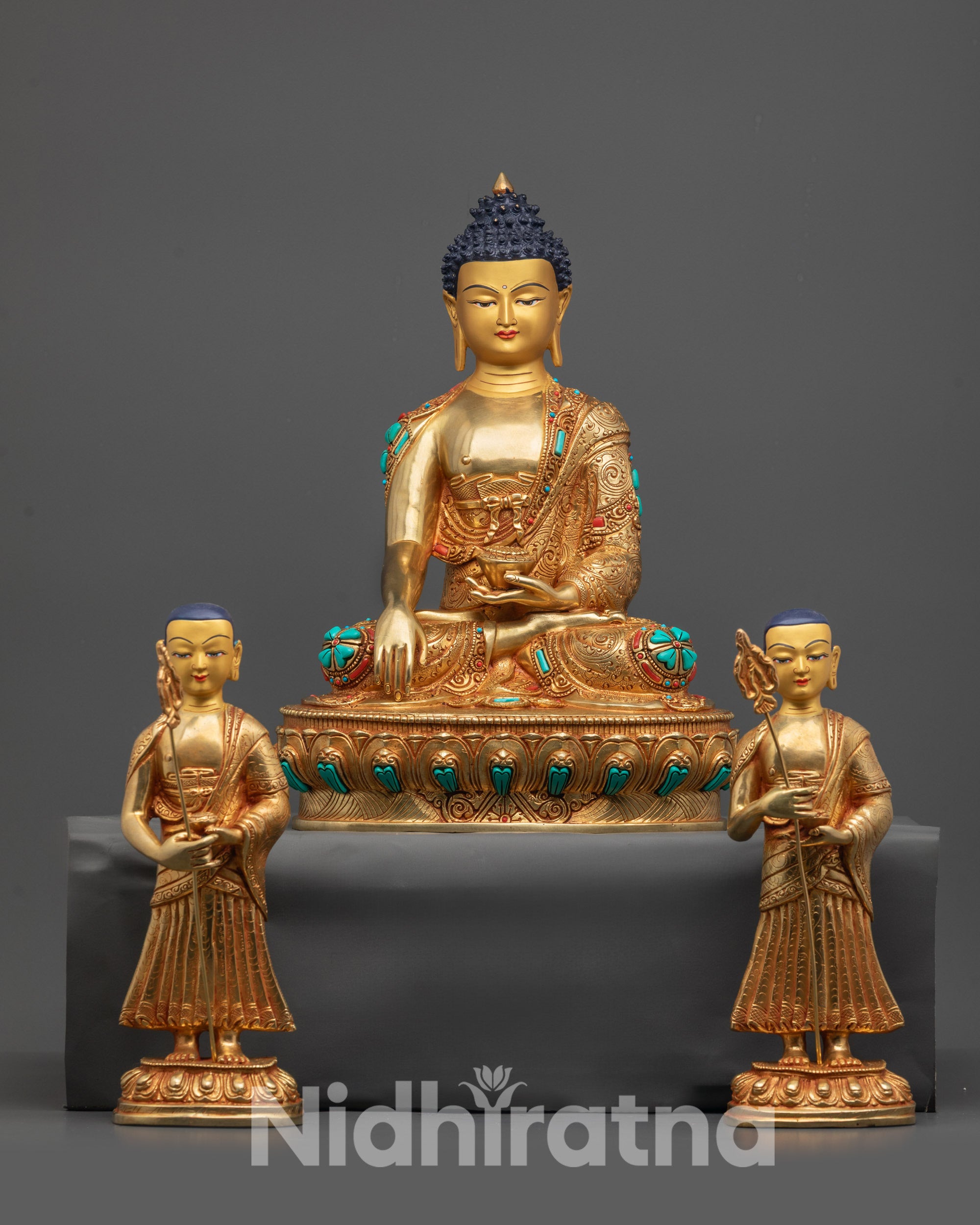 Front view of Enlightened Master Buddha Shakyamuni with Disciples gold-gilded copper statue